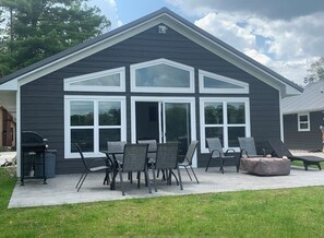 Lakeside patio with gas grill and gas firepit