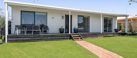 Front with verandah and garden