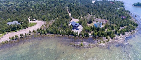 The astoundingly beautiful aqua-blue waters surround the cabin. It's a very short drive to the National Park, Bruce Trail, Tobermory and the sandy beaches of Singing Sands provincial park. 