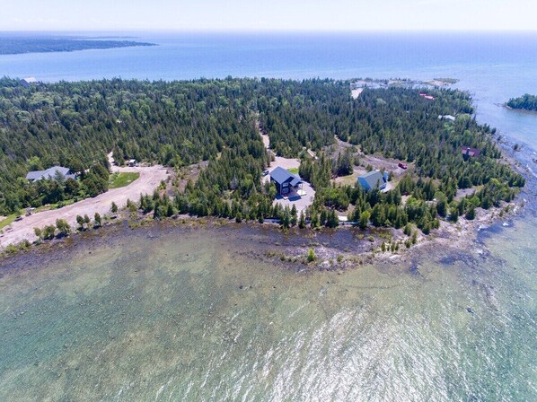 The astoundingly beautiful aqua-blue waters surround the cabin. It's a very short drive to the National Park, Bruce Trail, Tobermory and the sandy beaches of Singing Sands provincial park. 