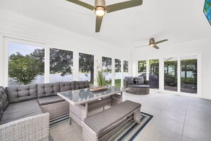 Enclosed Lanai with water views and TV