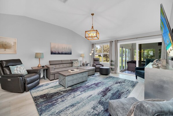 Spacious living room with 75” TV