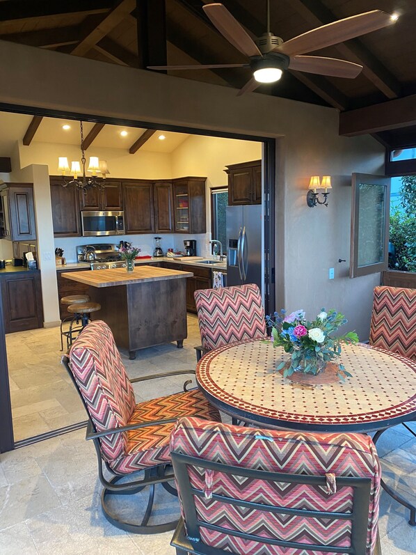 from enclosed terrace room looking into kitchen