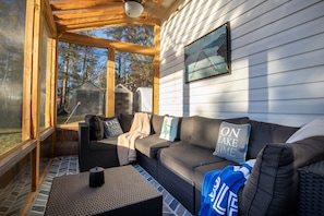 Screened in sunroom for bug-free enjoyment.