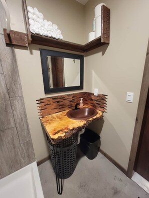 Bathhouse room vanity with handmade raw edge box elder.