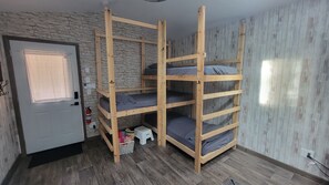 3 twin XL bunks, linens included.