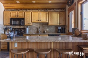 Kitchen with Bar Seating for 3