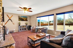 Cozy living room with smart TV and fireplace