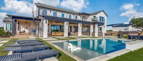 Backyard view + spiral staircase and balcony