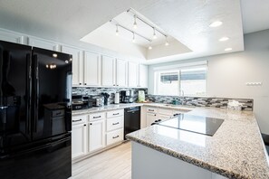 Full Equipped Kitchen with All Black Appliances