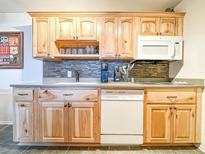 Whether you're preparing a gourmet meal or reheating leftovers, our well-appointed kitchen makes dining in a delightful experience during your getaway.