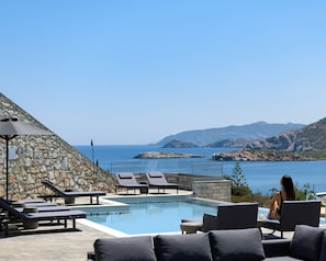 Luxury Villa is blissfully tucked away commanding breathtaking coastal view.