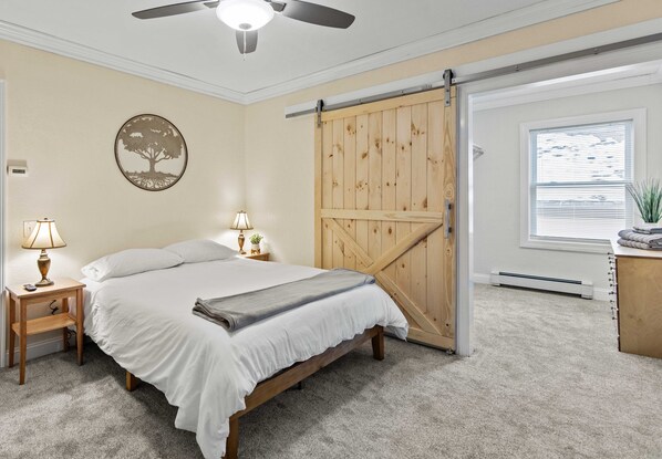 Guests will enjoy a large, walk-in closet, comfortable queen bed.