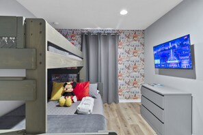 Mickey's Family Bunk Retreat: Playful Decor and Comfort for All!