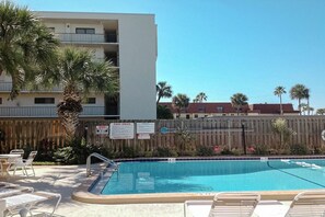 Take a refreshing dip and soak up the sun by the sparkling poolside oasis.