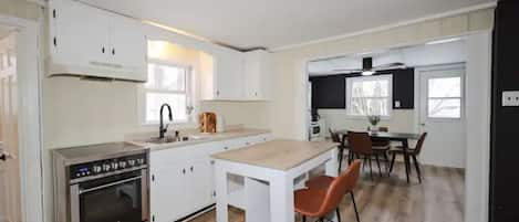 Kitchen with island and barstools