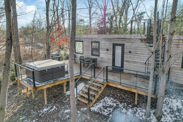 Back deck with hot tub and grill