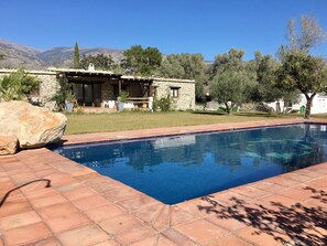 Cortijo front terrace and casita to the right
