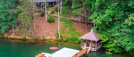 Gleesome Inn- Aerial lake view with gazebo on the lake and full dock access