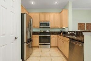 Fully Equipped Kitchen - This large kitchen includes everything you need to prepare simple snacks or full-course meals for you and your guests. It is a pleasure to use.