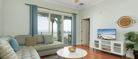 Welcome to this bright, airy, well-furnished ocean-view condo! - There's room for everyone to gather in the living room for games, TV, or to watch the beautiful sunsets! The sofa unfolds into a bed for 2, giving some lucky couple ocean views!