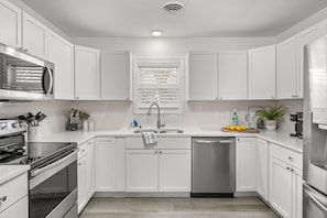 Clean kitchen with room to cook together