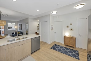 Spacious entry area opens to the large kitchen and laundry room. 