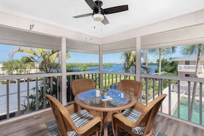 Private screened lanai over looking Lemon Bay & Pool Area