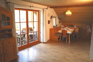 Living room with view to kitchen