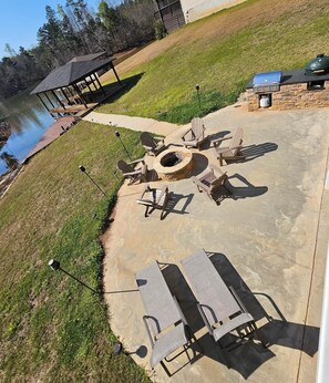 Light the fire and sink into an Adirondack chair for peaceful evenings together (1)