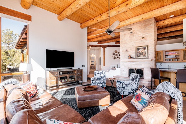 Living Room Offers Large Sectional, Accent Seating and Smart TV