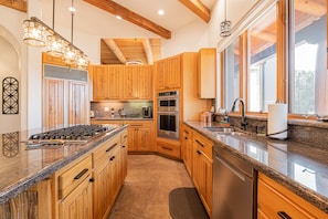 Large and Open Kitchen- Fully Equipped with Stainless Steel Appliances