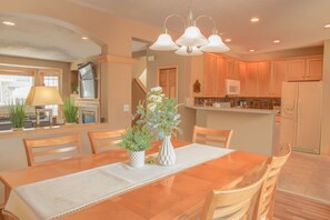 Dinning room view towards kitchen (right) and living room (left)