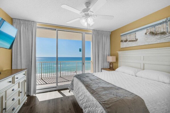 Master bedroom view with balcony access, tv & very comfortable kingsize mattress