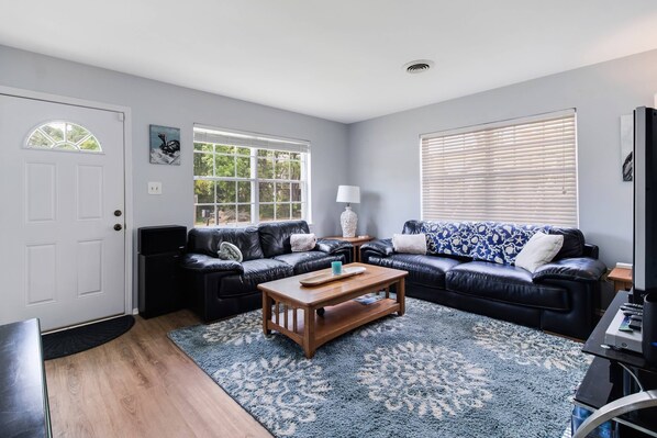 Large Windows allow for lots of Natural Light. Bring your Favorite Games/Puzzles, there's a great Large Coffee Table to Play on.