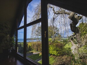 Our dramatic view window of the main garden and Sea below
