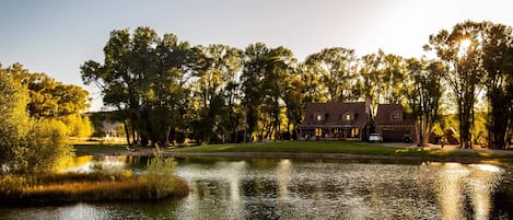 View of ranch house from lake
