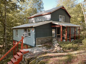 Straight out of a fairytale! You don't have to climb a ladder to enter but the house has serious treehouse vibes since part of it is built on stilts!