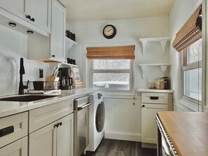 The kitchen features a gas stove, dishwasher, coffee maker, bean grinder, microwave, toaster, blender & food processor. We offer our guests complimentary coffee, tea, olive oil, & basic spices.