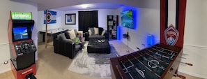 Downstairs game room with 60" TV