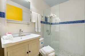 3-piece bathroom with a hot-water shower.