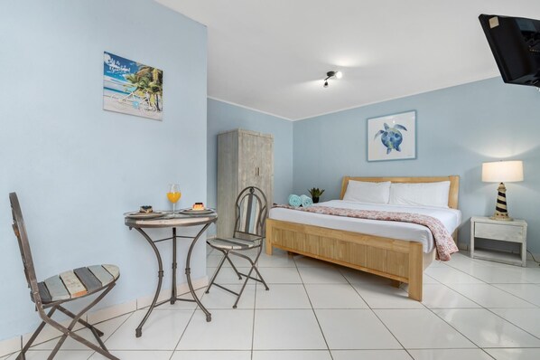Spacious studio apartment with ample storage space.