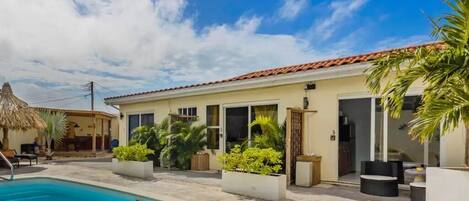 Entrance and poolside seating