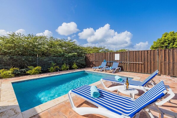 Take a plunge and enjoy the sun in the pool area.