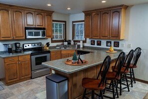 Fully stocked kitchen includes plenty of counter space