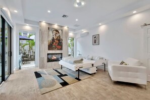 "Modern masterpiece with a touch of warmth. This living room is pure perfection."