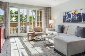 Living room features a queen sleeper sofa.