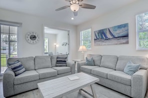 The Family Room Looking Towards the Den, With the Doors Open