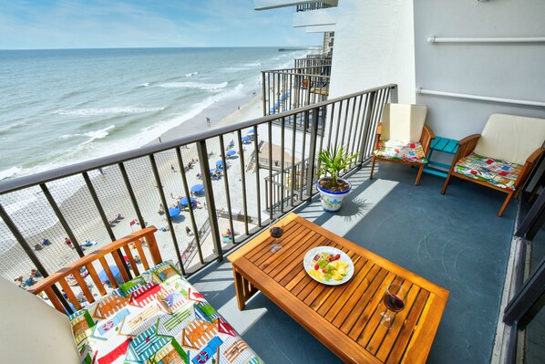 Balcony with Garden City Beach Pier within walking distance in the background. 