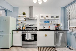 Indoors, Kitchen, Refrigerator, Lamp, Cooktop